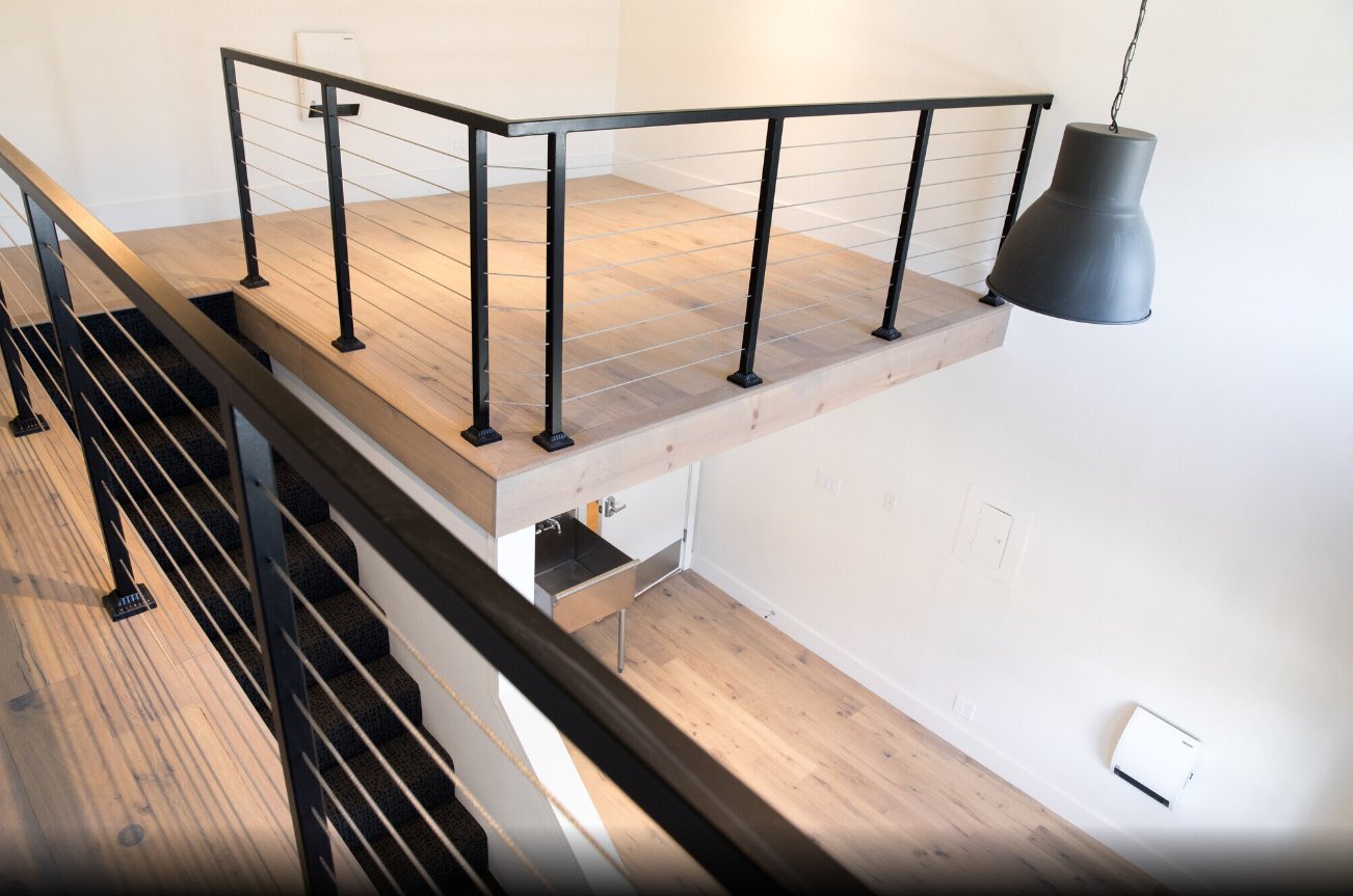 Loft mezzanine with steel railing